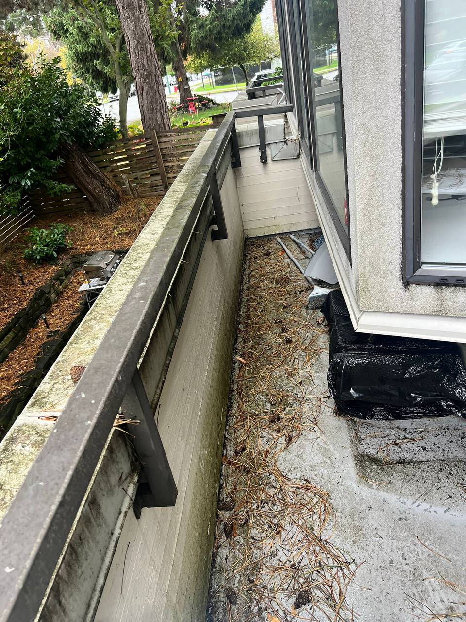 Before: balcony cleaning in Vancouver