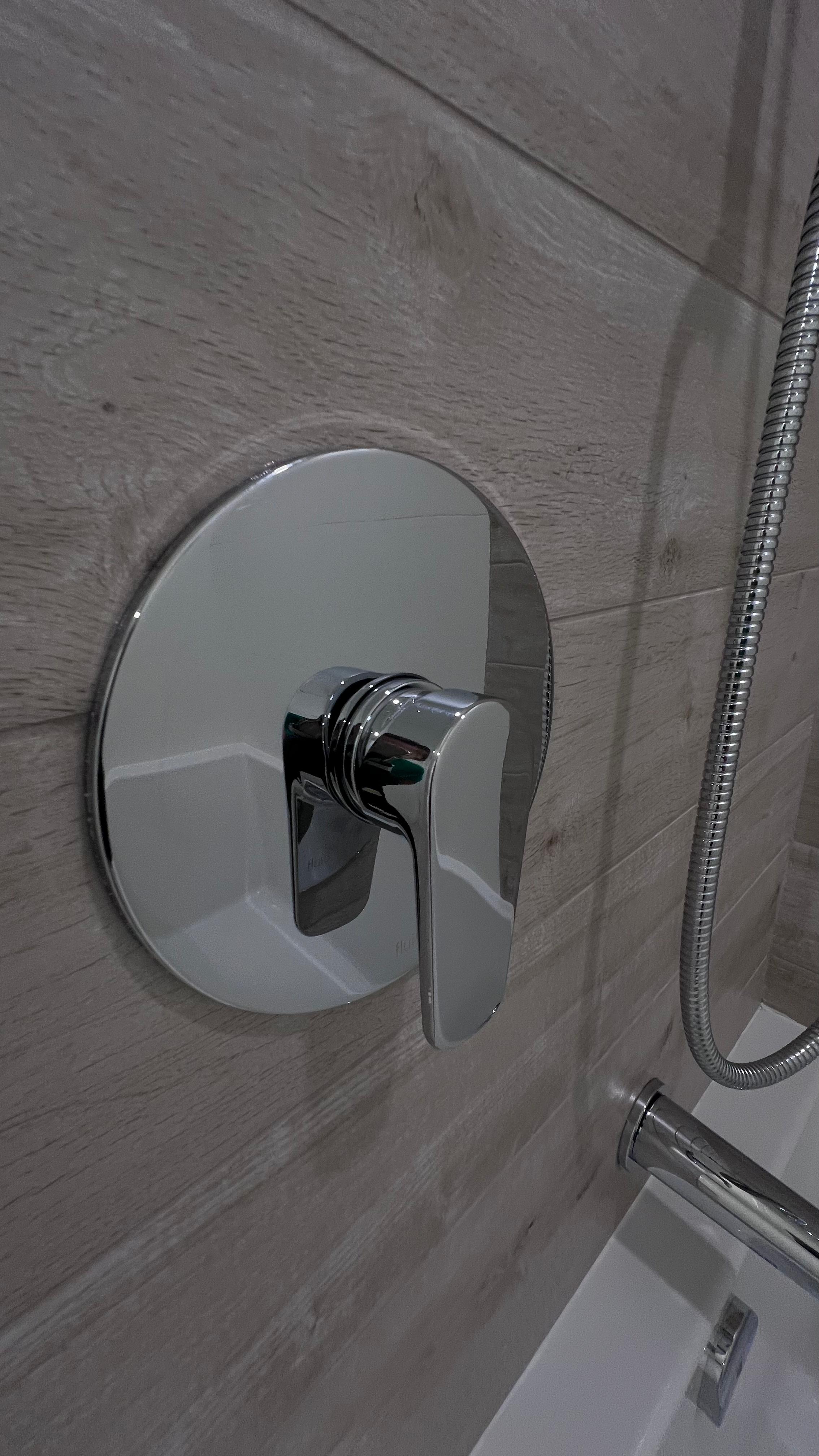 After: faucet and sink area polished and cleaned in Vancouver