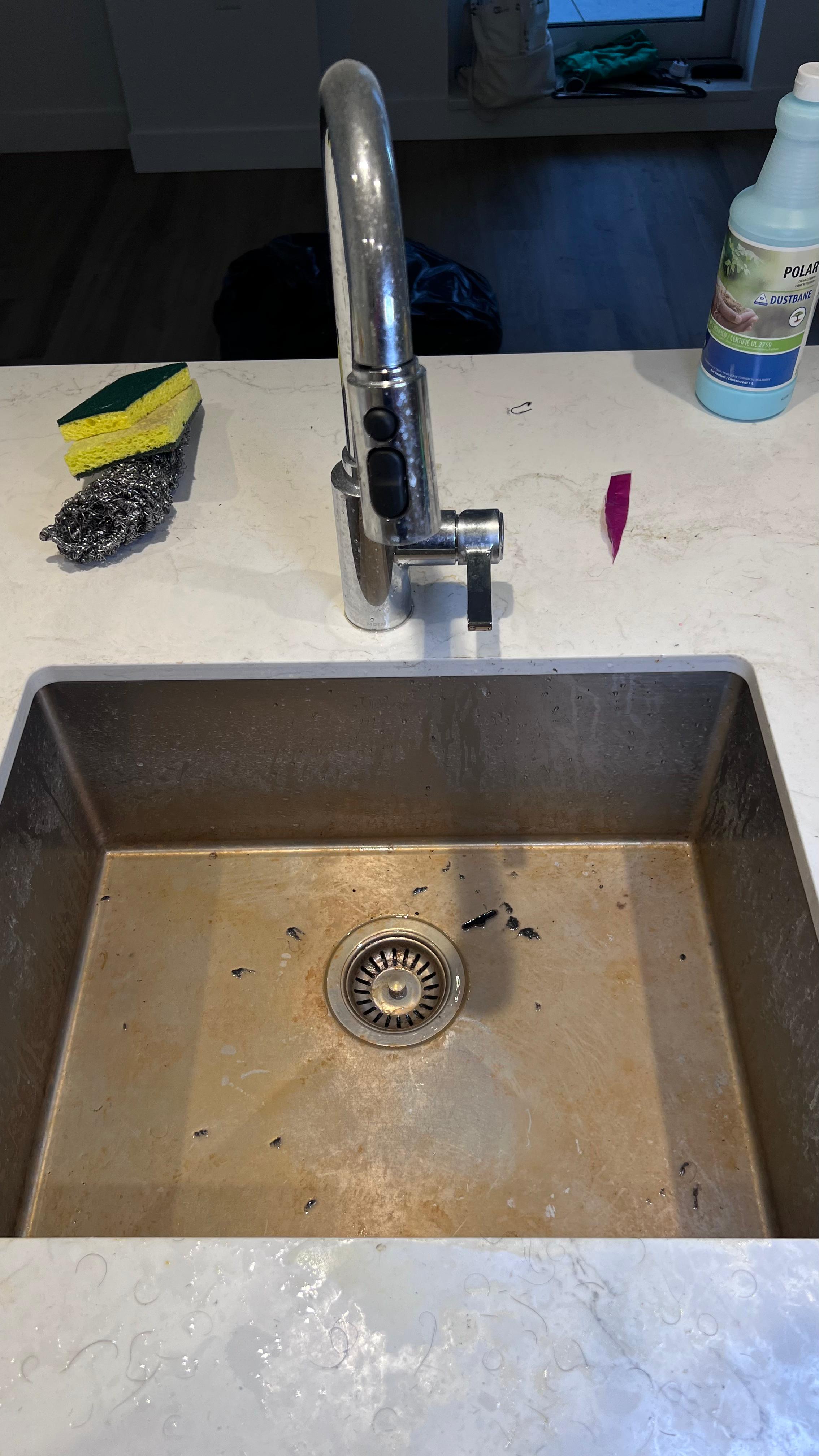 Before: sink cleaning with buildup in Vancouver